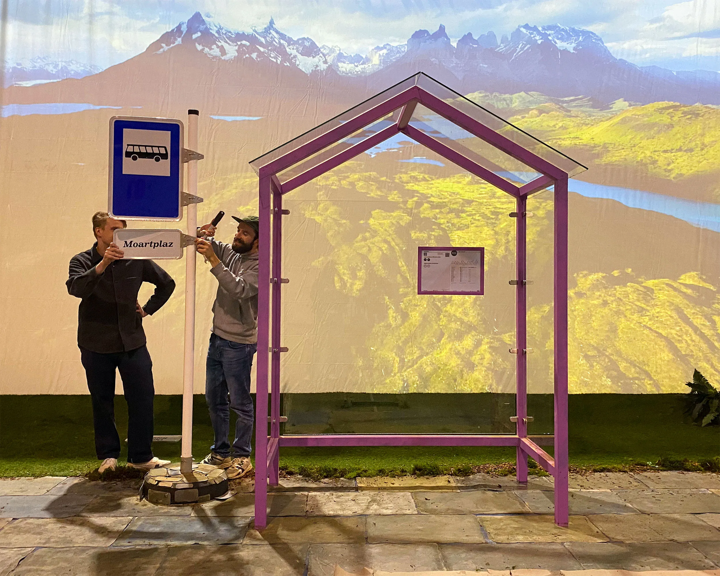 SKIN Studio Team - Wide shot of two team member building the video set